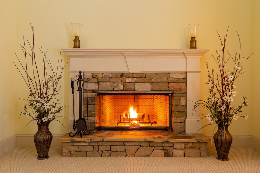 an elegant fireplace decorated with pots