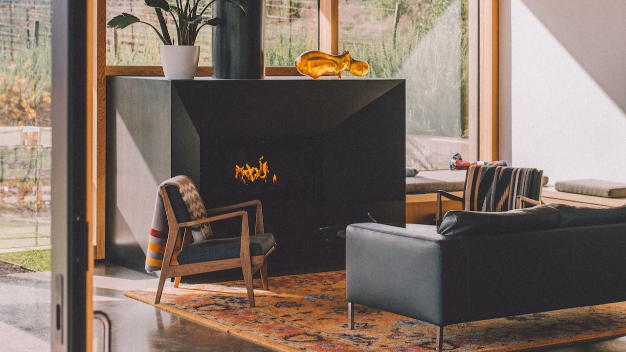 an electric fireplace in an RV close to the door